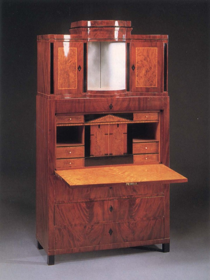 19th Century AUSTRIAN ,   Biedermeier Mahogany, Fruitwood and Burl Walnut Fall-Front Secrétaire  ,  1820-1825  
  Mixed woods ,  76 3/8 x 42 1/8 x 18 3/4 in. (194 x 107 x 47.6 cm)  
  The superstructure is fitted with a mirrored niche and flanked by two incurved cupboard doors surmounted by a stepped cornice above one frieze drawer and the fall-front opening to a fitted architectural interior centered by  
  BIE-001-FU  
   Appraisal Value : $0.00 
 Location : $0.00 
 User3 : $0.00